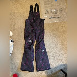 The North Face snowboarding onesies for women in XS